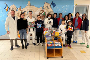 “Leggere insieme per crescere: il Fight Club Ravenna dona libri alla Pediatria di Comunità con il Charity Fight di Natale”